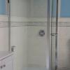 Completed with modern shower door enclosure